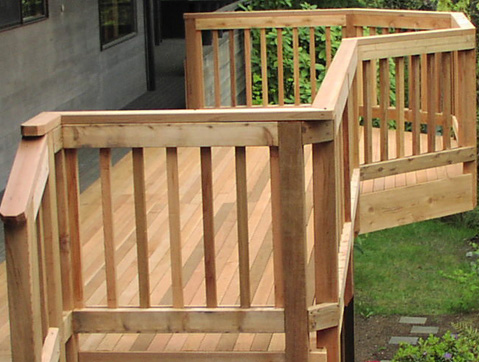 Wood deck railing designed by Environmental Construction Inc. in Kirkland WA