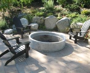 Fire ring on patio by Kirkland Landscape Company, Environmental Construction