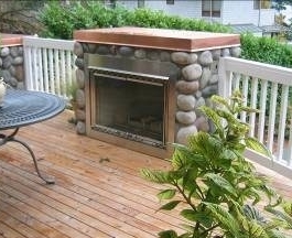 Fireplace on deck designed by Environmental Construction, Kirkland WA
