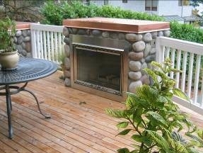 Fireplace on a deck designed by Environmental Construction Inc. in Kirkland WA