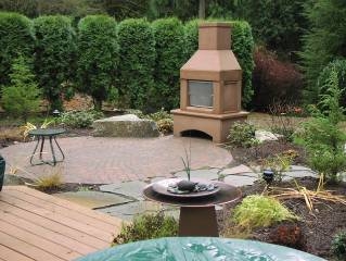 Fireplace on a patio designed by Environmental Construction Inc. in Kirkland WA