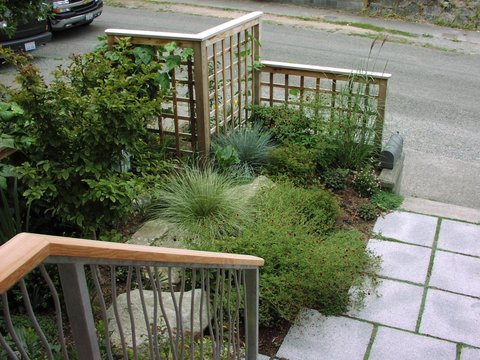 Wood and metal hand railing designed by Environmental Construction Inc. in Kirkland WA