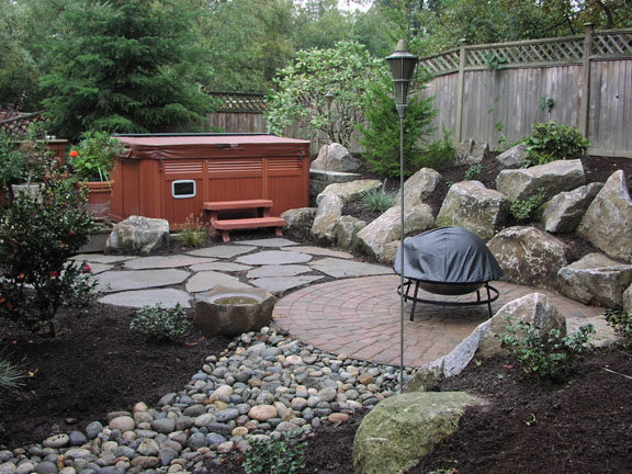 Swale installation in a landscape, by Environmental Construction Inc. in Kirkland WA