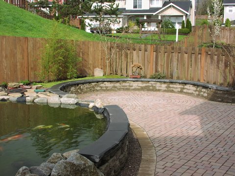 Wall for pond designed by Environmental Construction Inc. in Kirkland WA