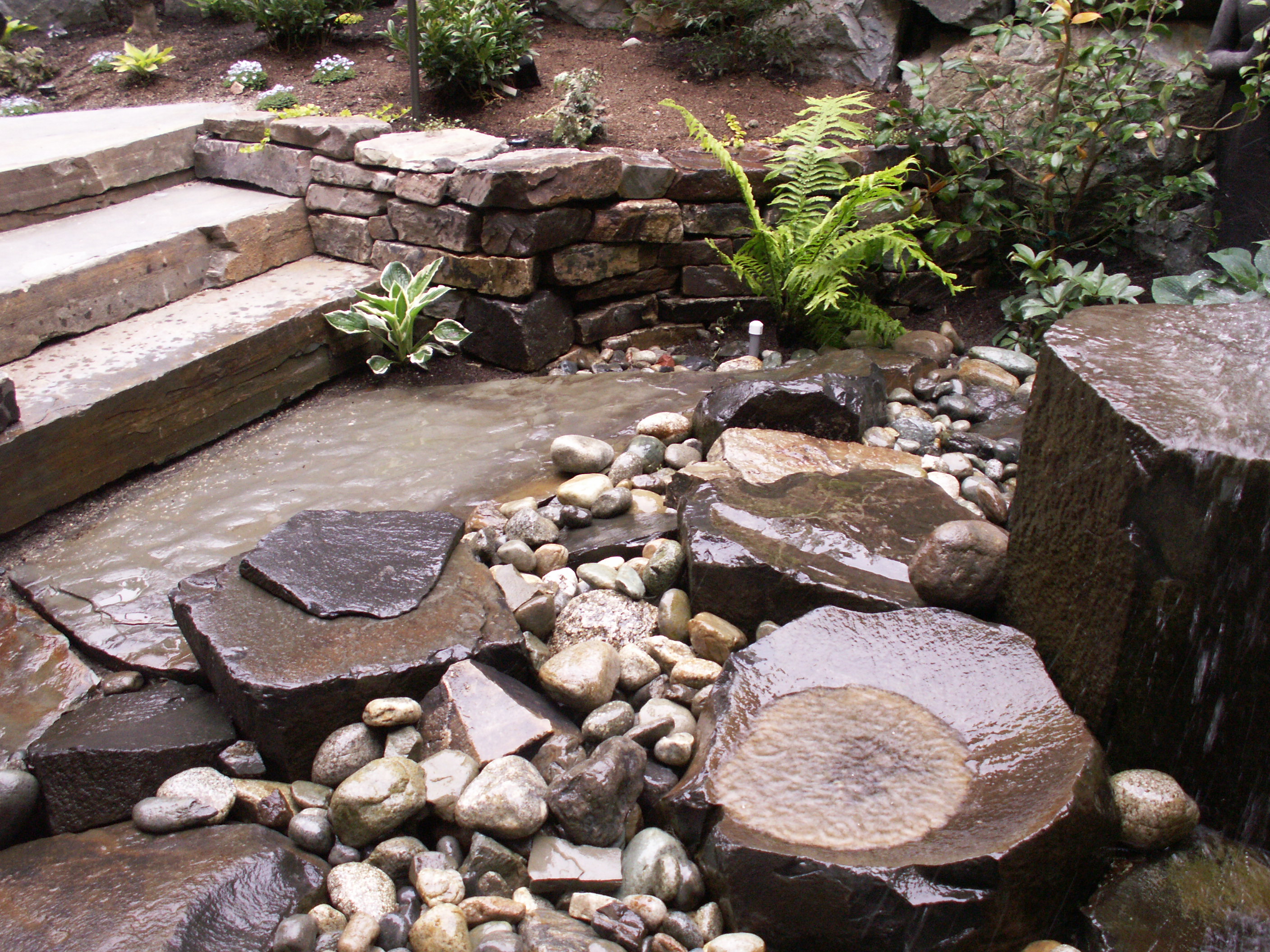 Stone fountain designed by Environmental Construction Inc. in Kirkland WA